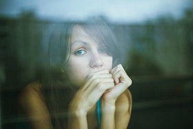 woman gazing out a window